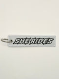 She Rides keychain zwart