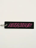 She Rides keychain roze