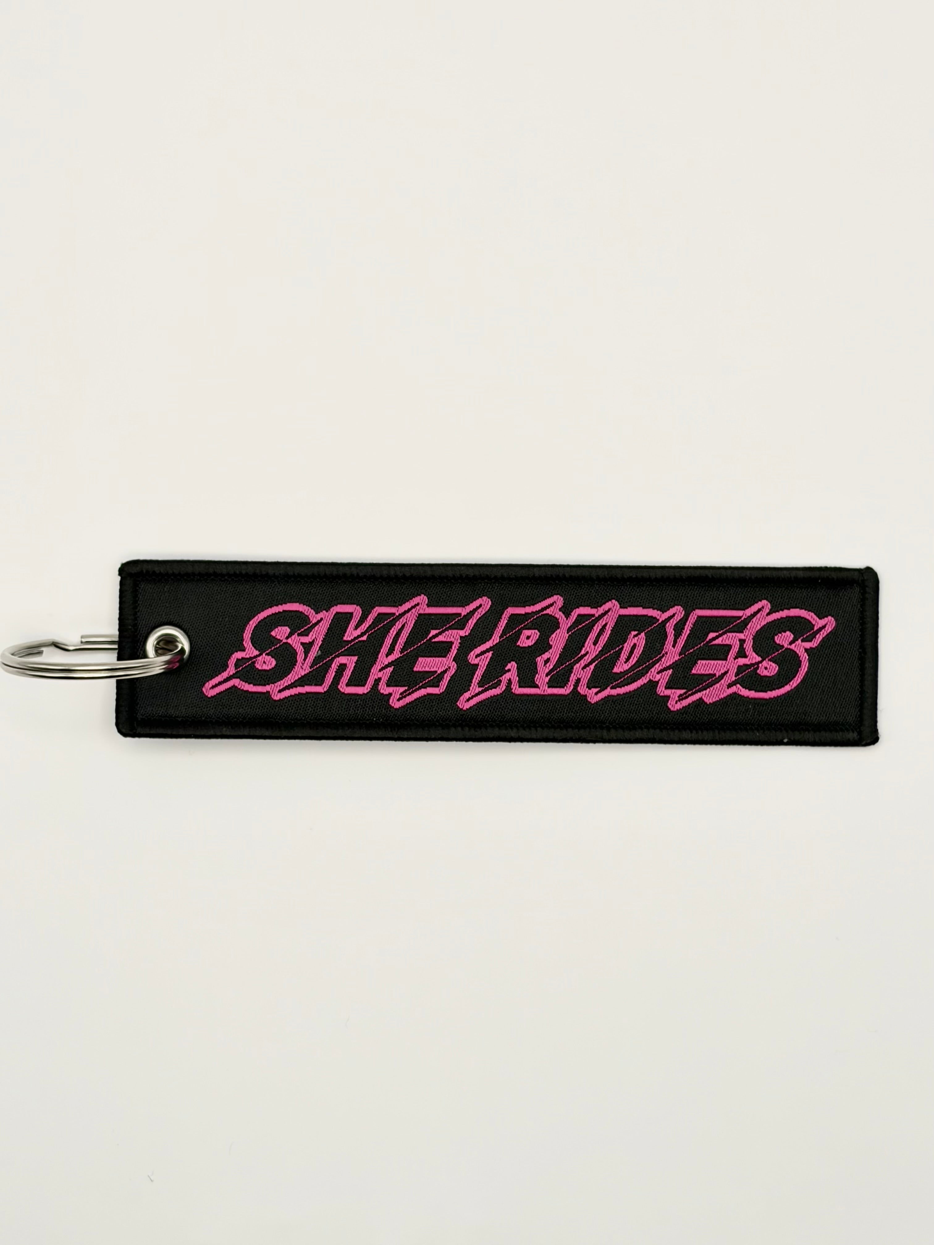 She Rides keychain roze