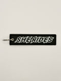 She Rides keychain wit