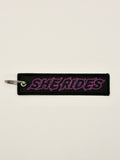 She Rides keychain paars